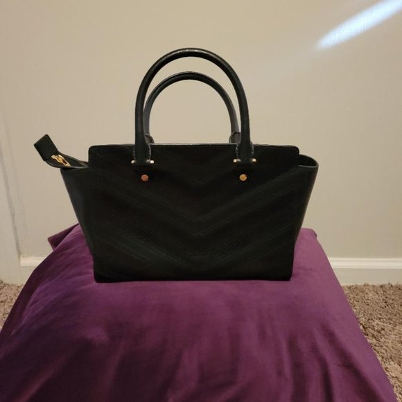 Michael Kors black handbag with multiple textures. - Picture 2 of 7